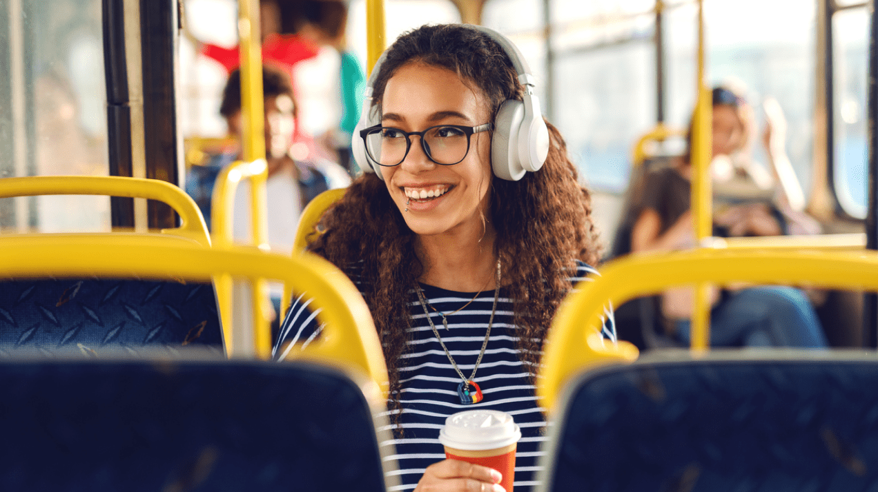 Public transportation - woman enjoying bus ride